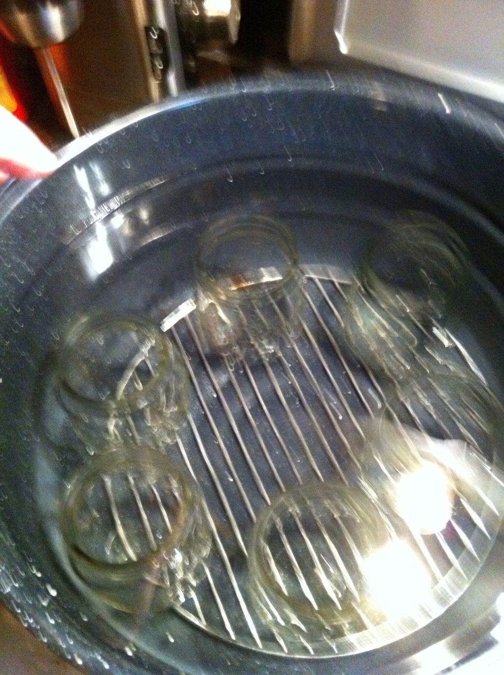 And arrange glasses so they are not touching. The metal rack in the bottom prevents direct contact to the heat.