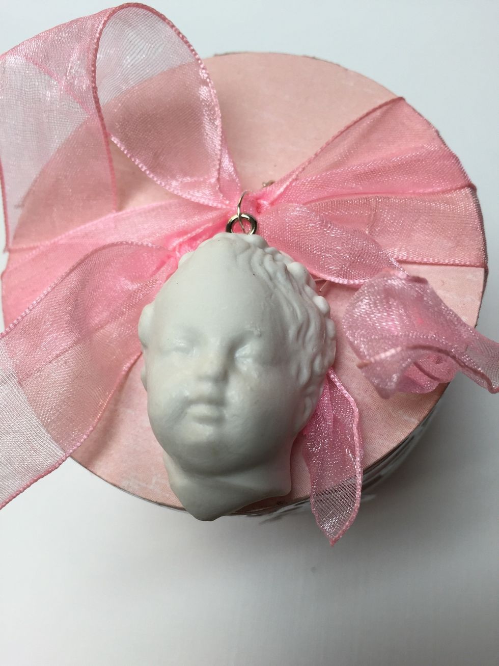 And attach your cherub as the finishing touch