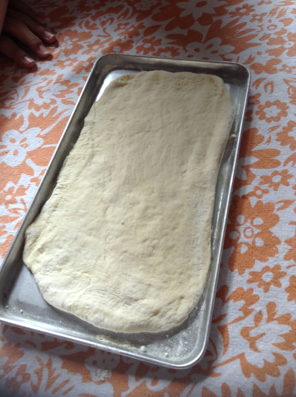 And begin to spread the dough