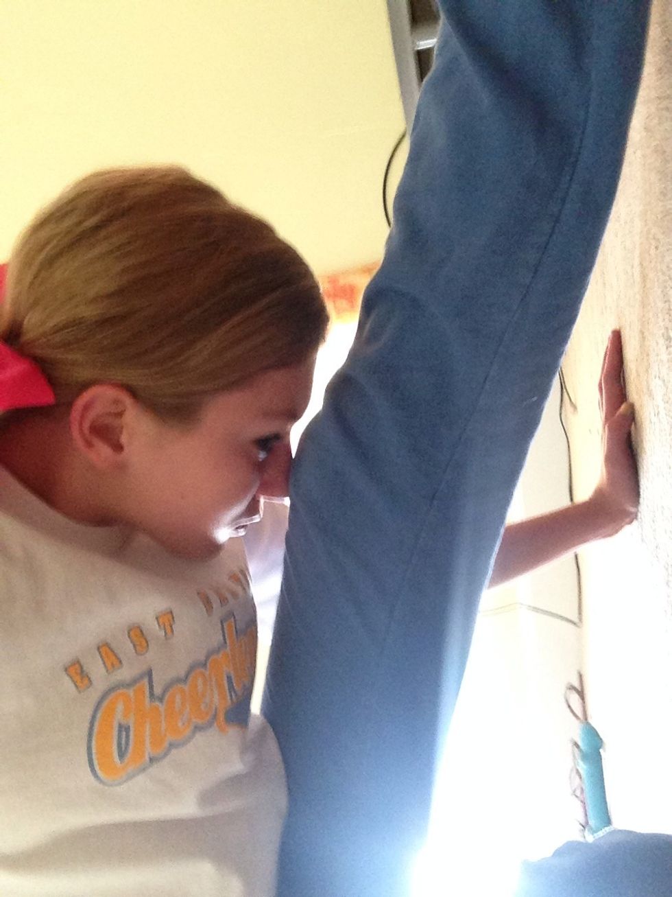 And bring your face to your knee