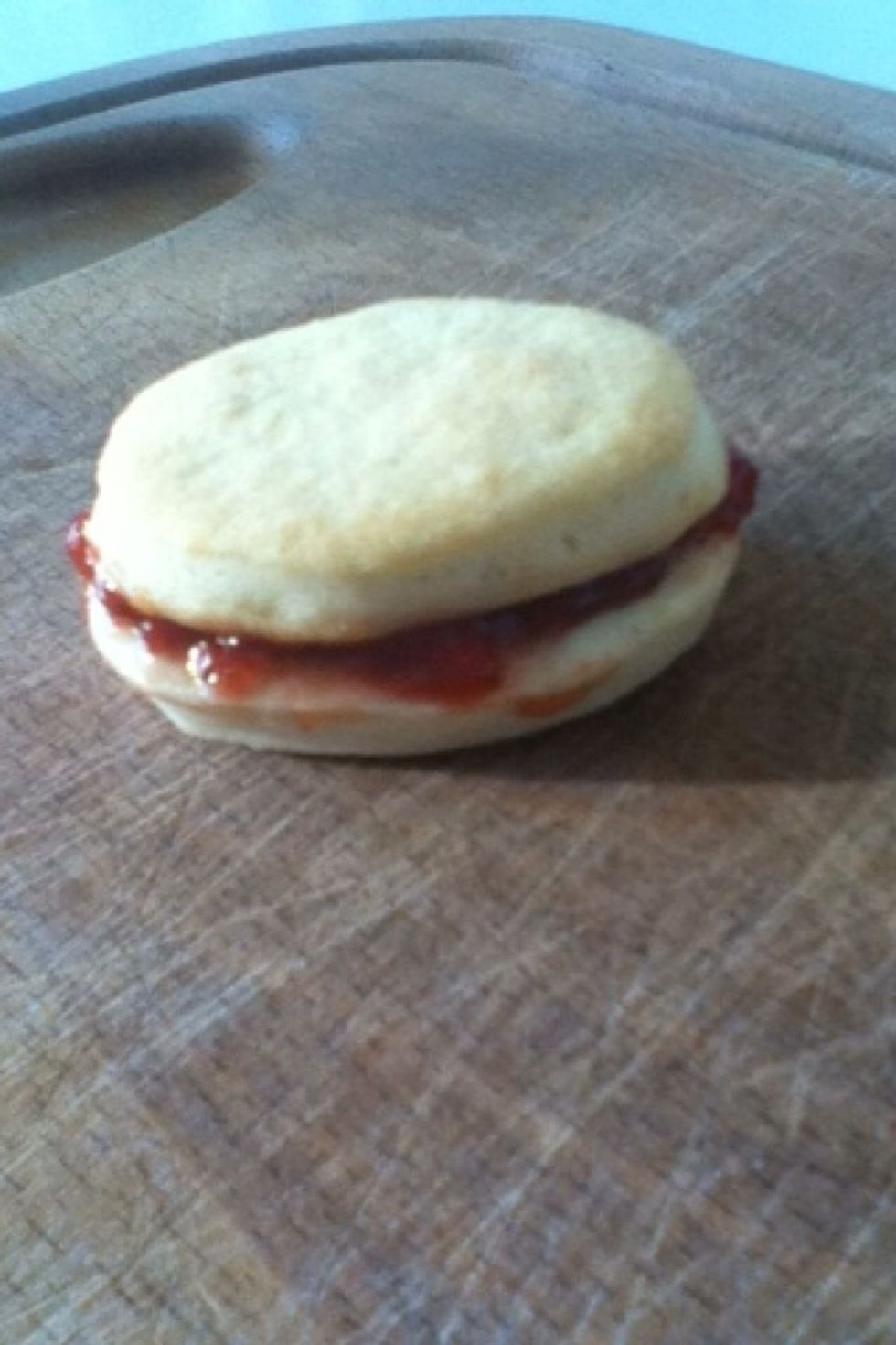 And but it on one of the cakes and put another over, like in the picture.