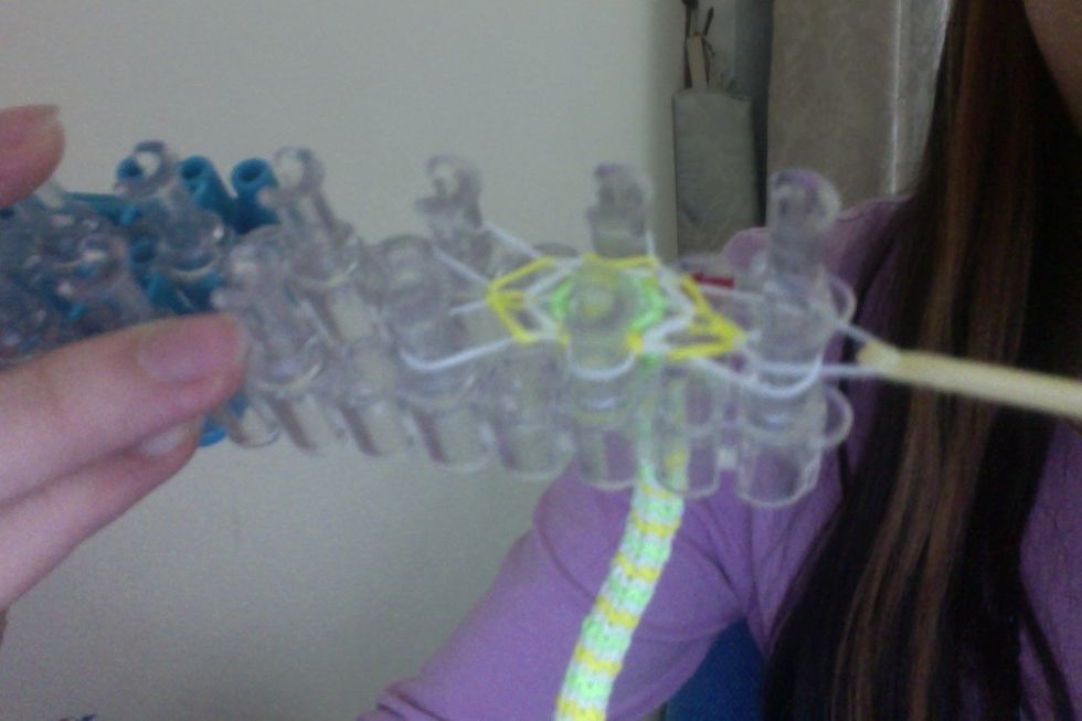 and but it on the peg in front of it.