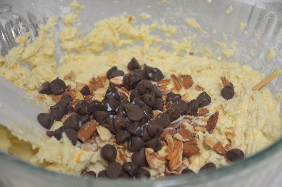 And chocolate chips and fold them into the mixture. Use a spatula to mix.