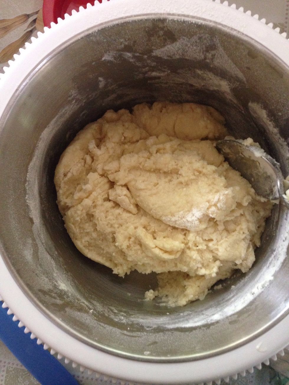 And combine well to get an elastic dough. Don't add too much flour as the crust will be hard and the smell won't be good