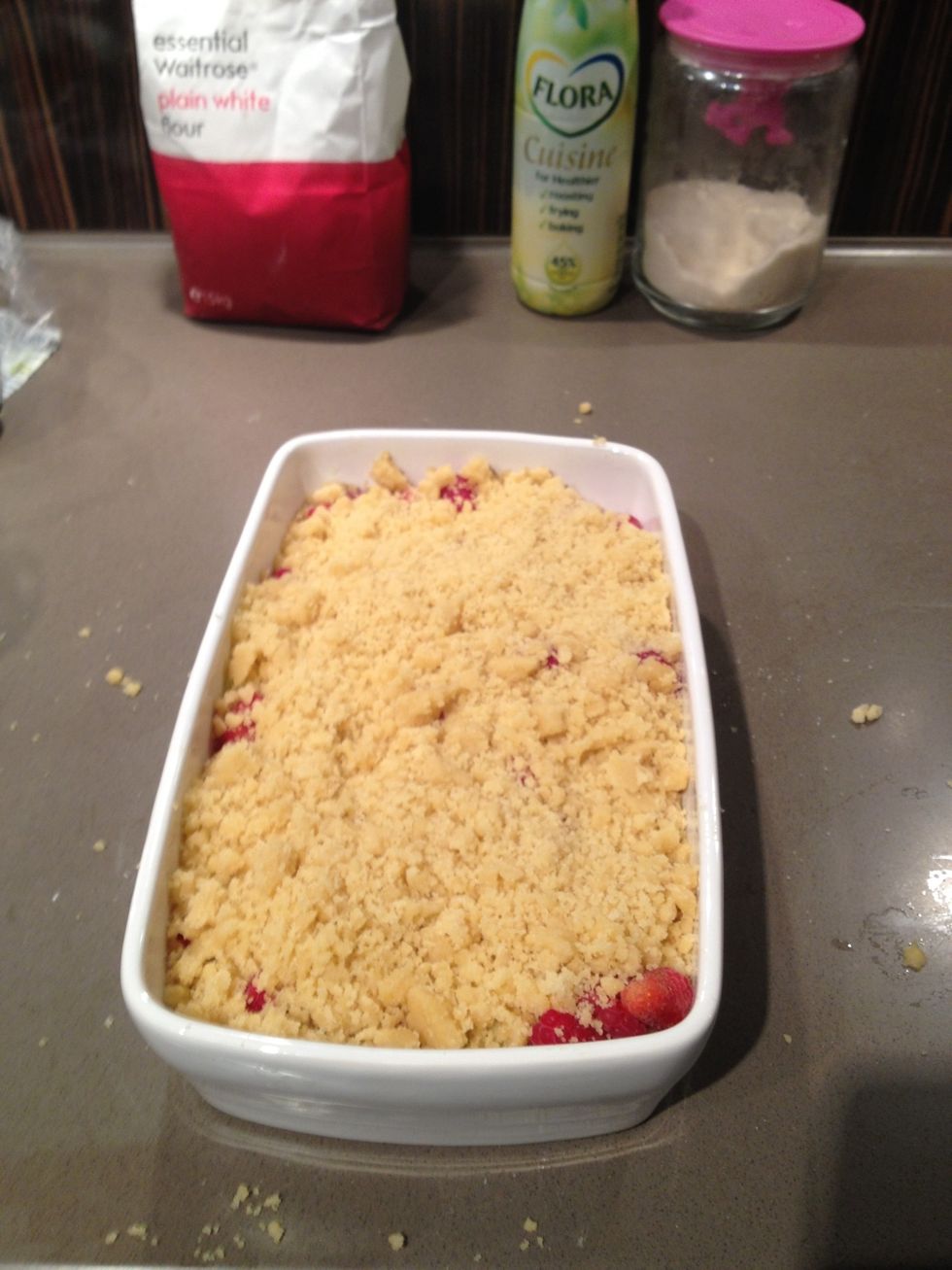 ...and cover the fruit with the crumble mixture. Place in a 180 degree celcius pre heated oven for 20 minutes.