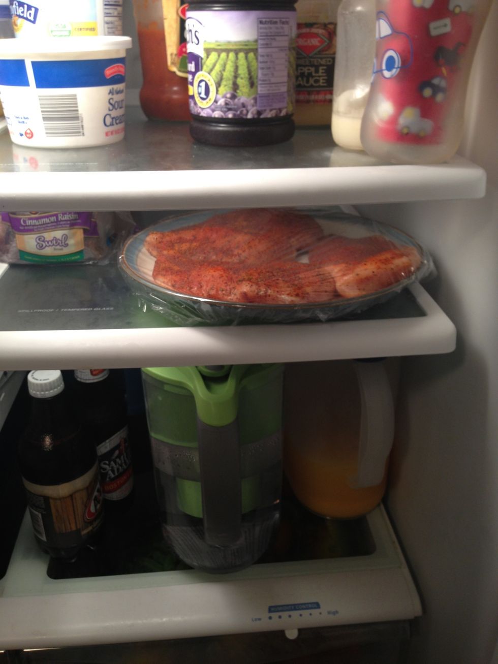 ... and cover with plastic wrap. Put back in the fridge for at least 30 minutes. This allows the rub to sink into the meat even further.