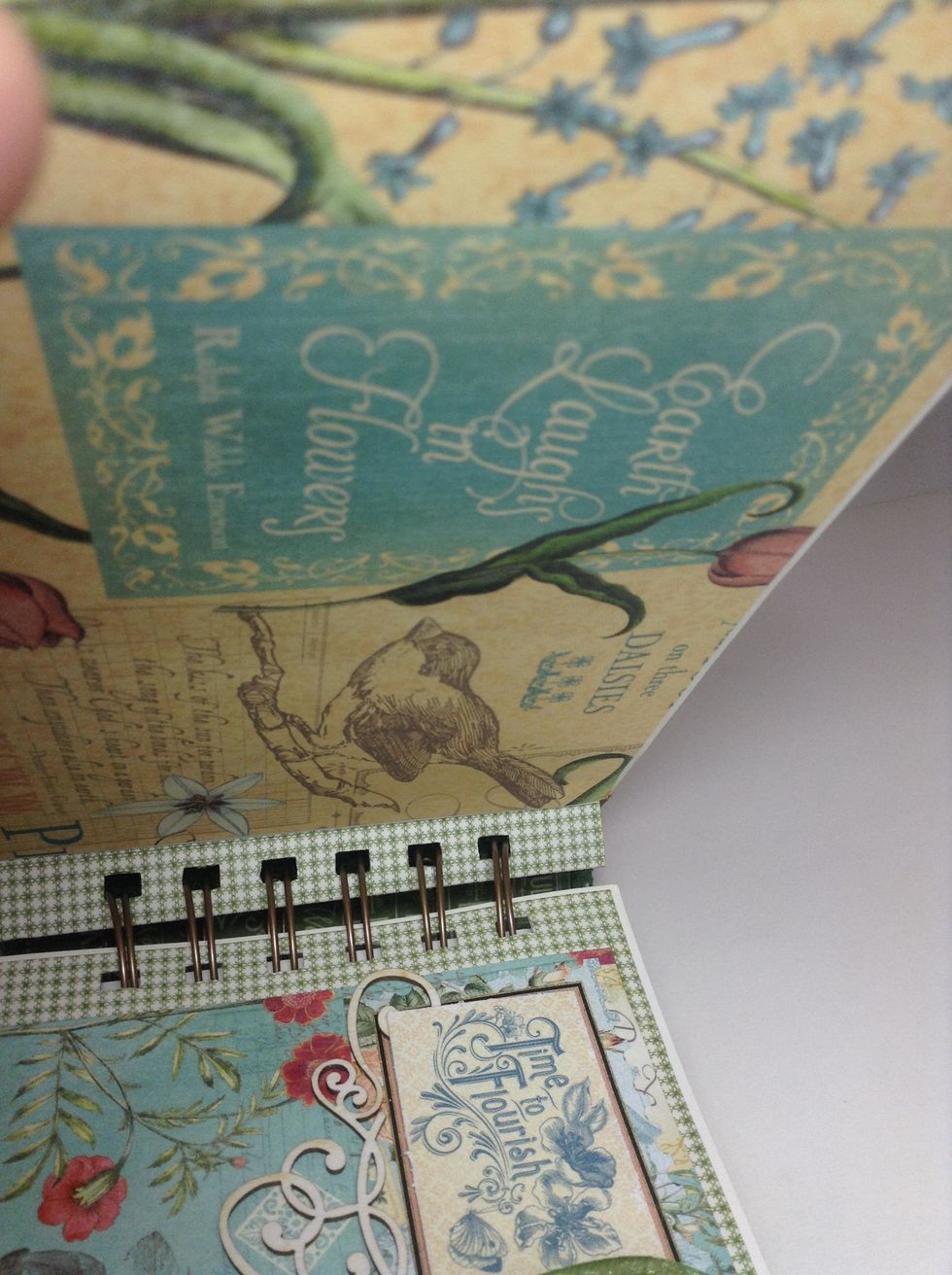 And covering back of the cover with a sheet of paper of your selection. This is how the calendar will look when opened!