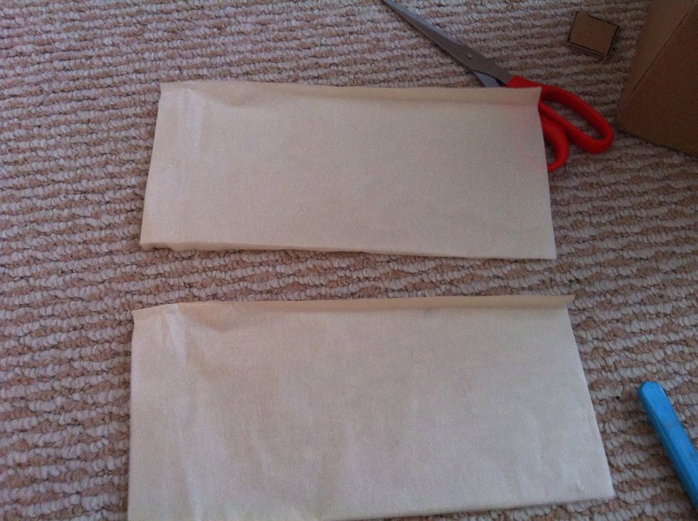 And cut a rectangle out with 4 sheets each.
