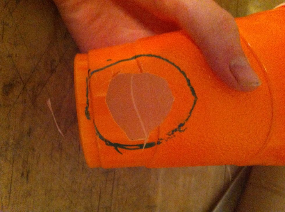 And cut out a small he inside the drawn circle