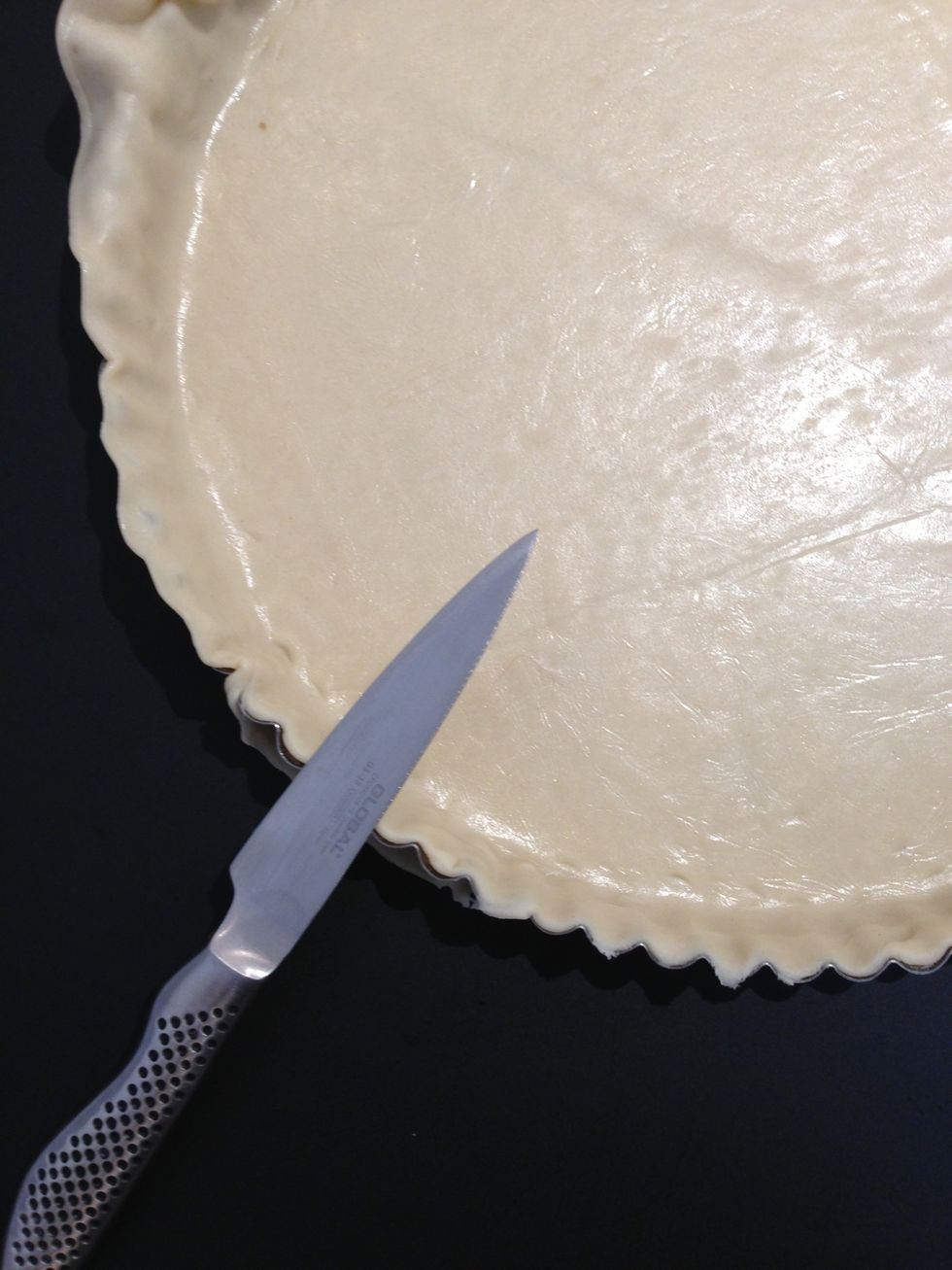 And cut the extra with a knife or use your rolling pin to get rid of the extra.  A tip. If you are using the ready crust without spreading it thinner, using a knife at hand would b easy