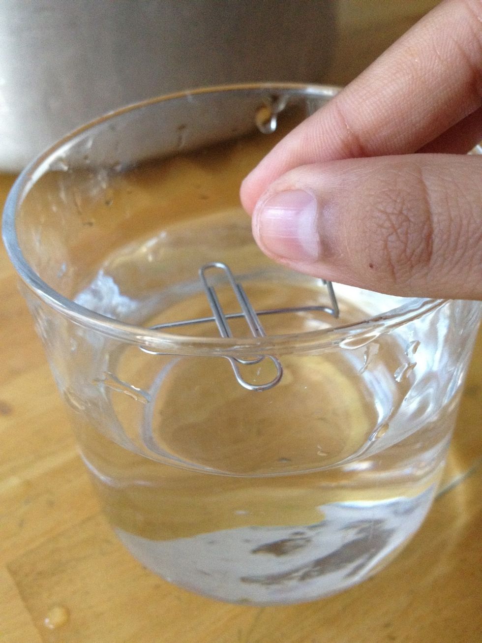 , and dipping it in the water.