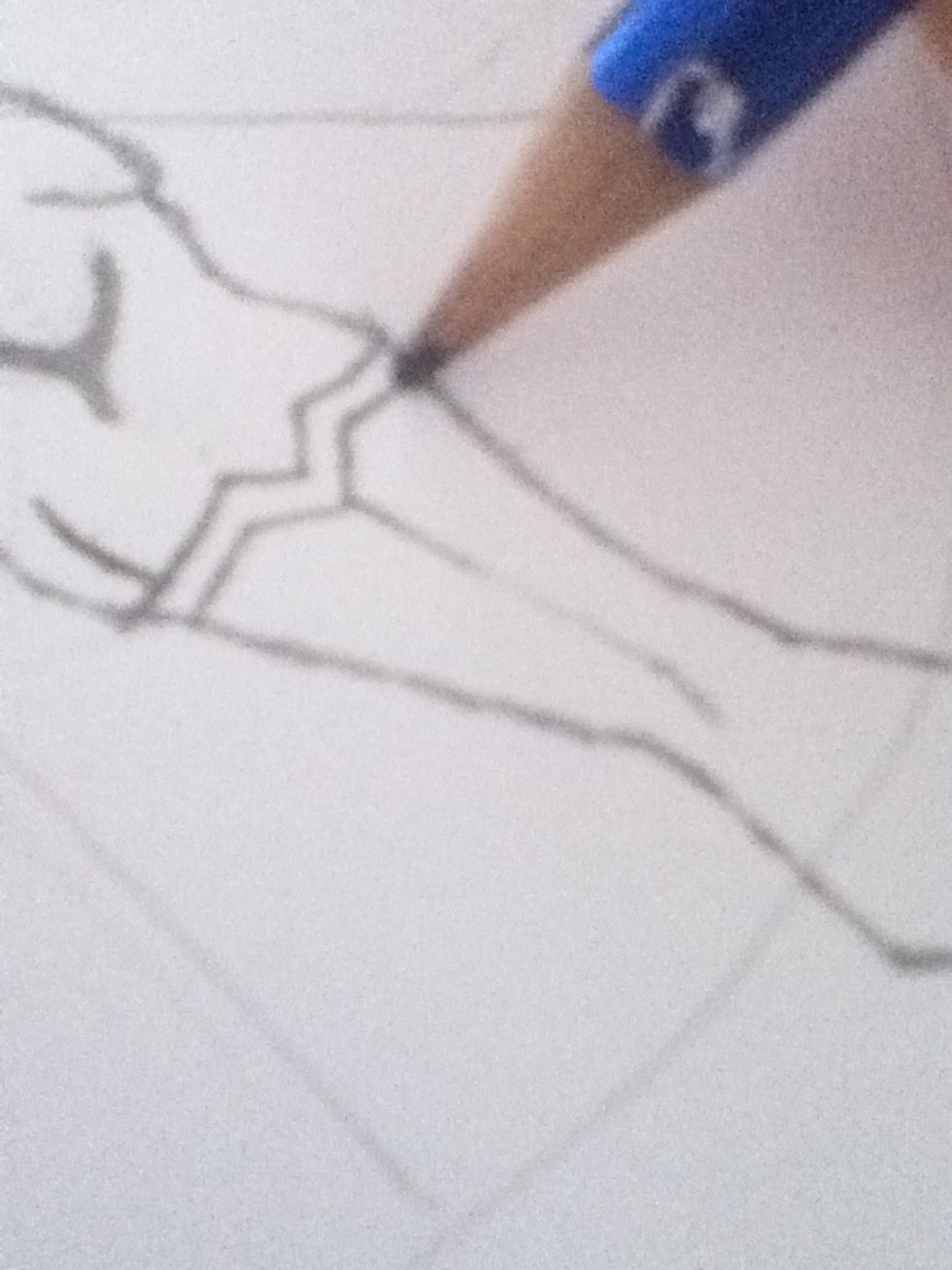 And draw a long v shape to show where the shoes will start