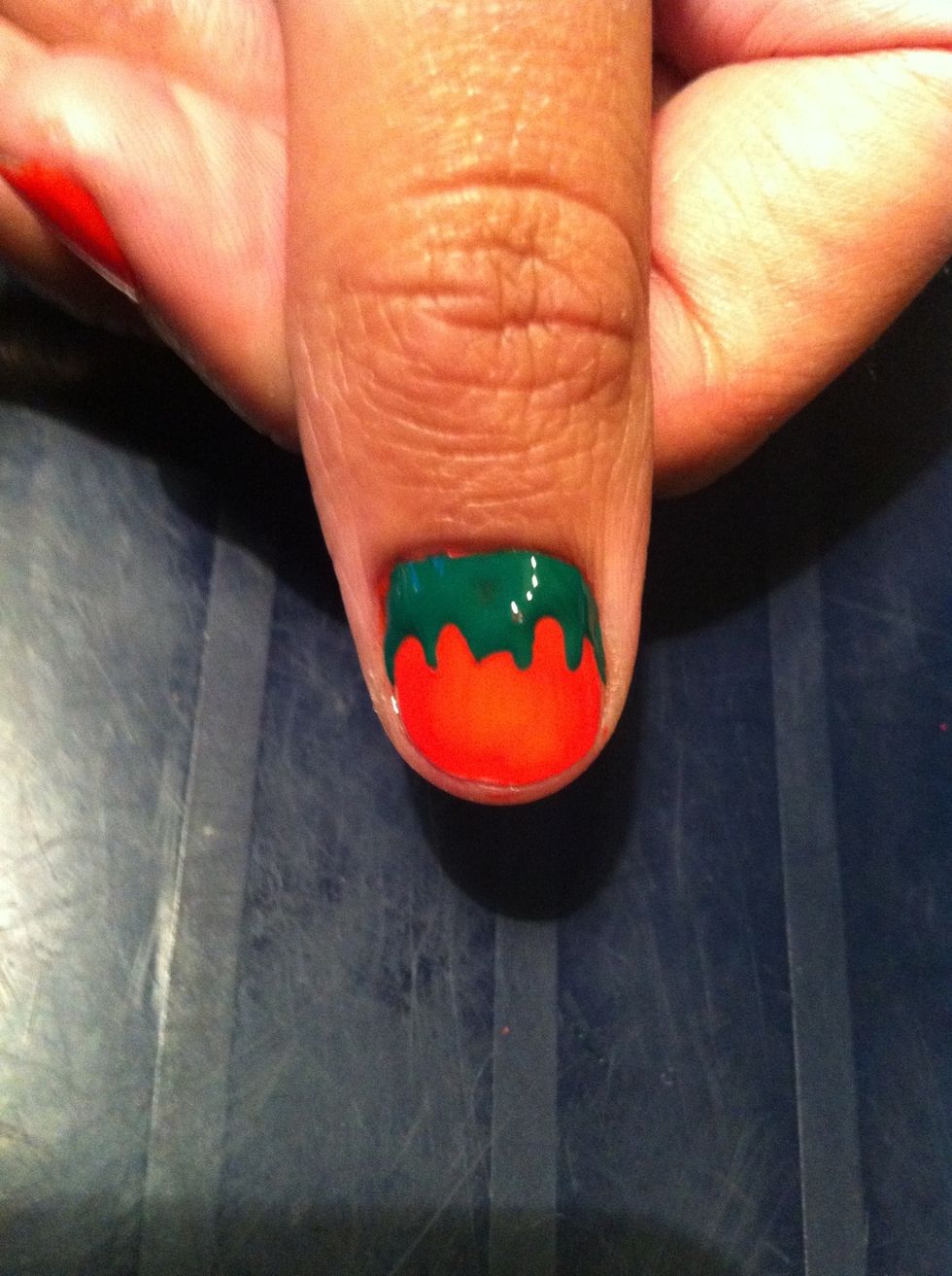 And draw little green stalky things at the top of the nail