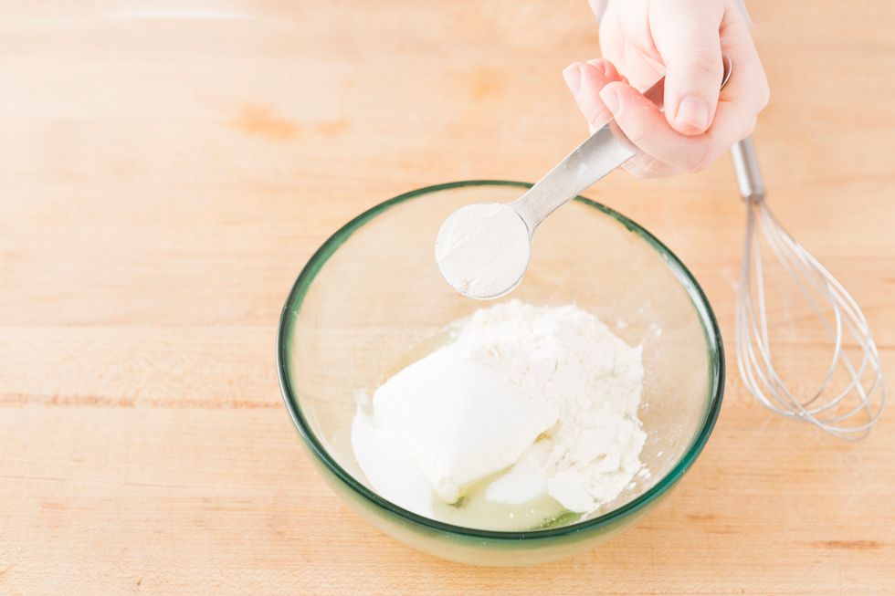 And finally 3 tablespoons of all-purpose flour. Now mix it up with either a whisk or a hand mixer.