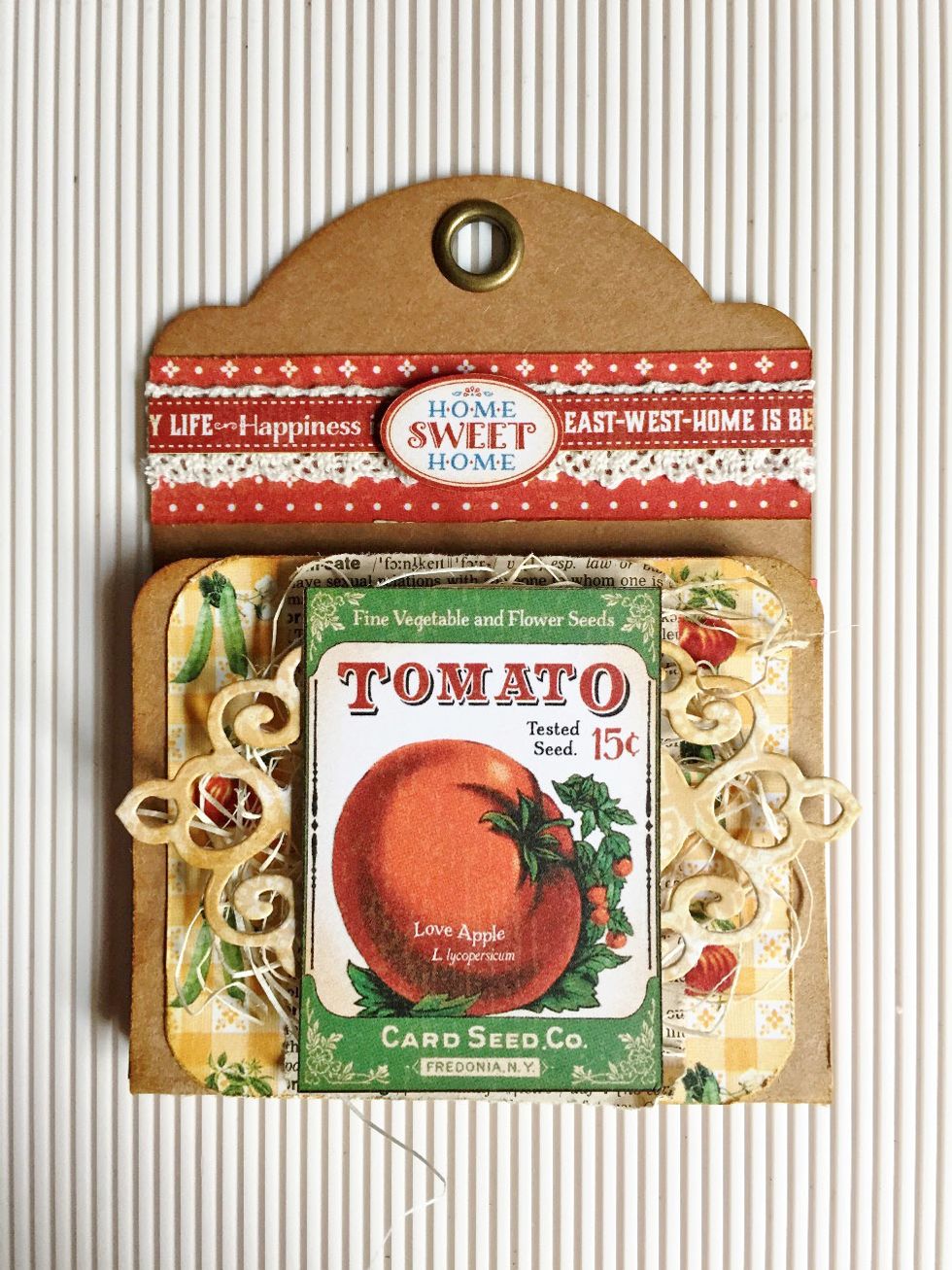 And finally add the final images over... This will be the seed pocket for Tomato seeds which you can place the seeds inside the pocket which you had created from the large tag...