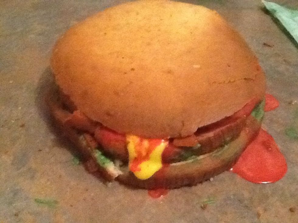 And finally add your top bun and enjoy your hamburger cake