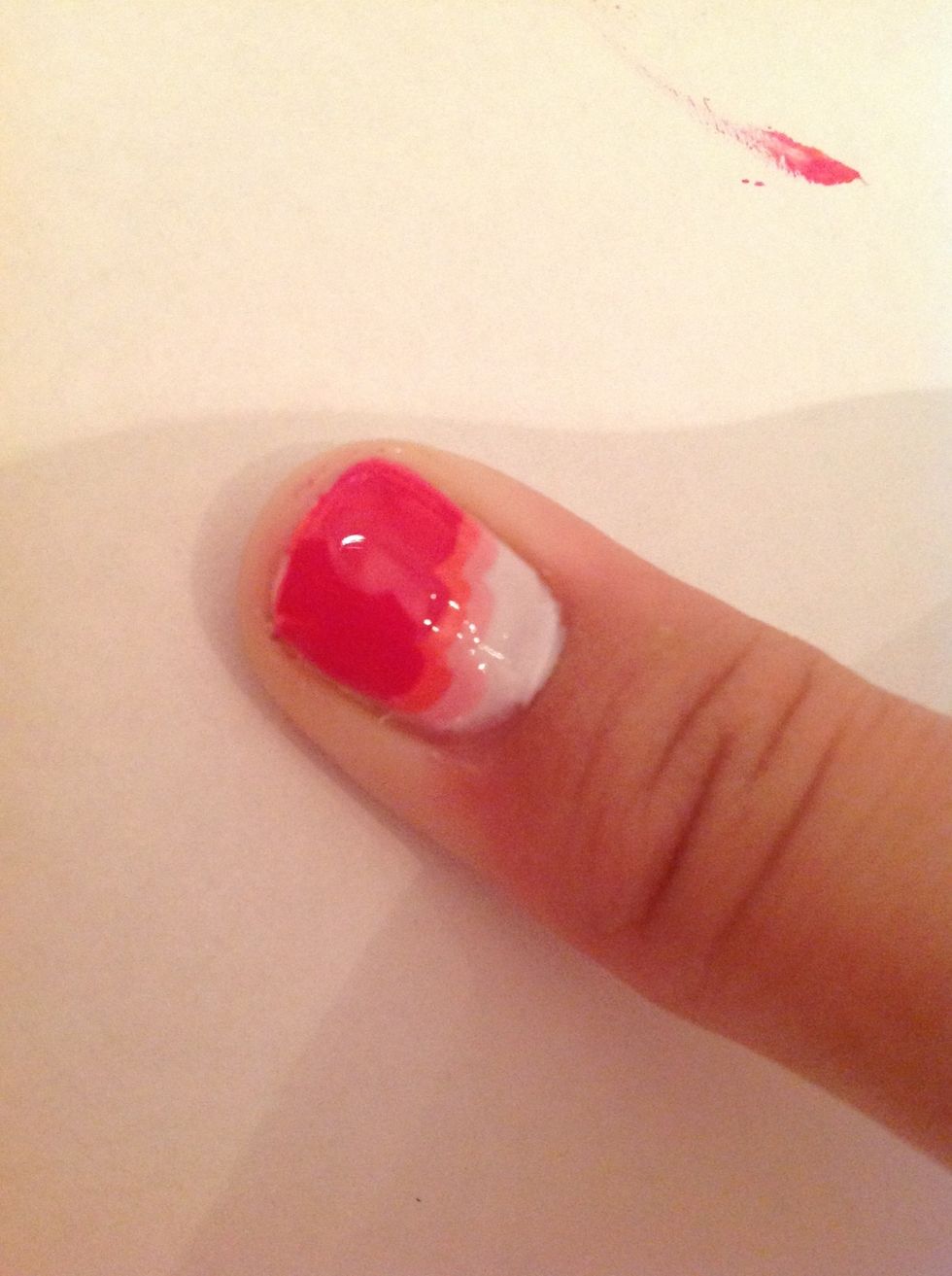 And finally do the same thing with the last coat, and add a top coat on top if needed. Touch up messy bits with earbuds soaked in nail varnish remover