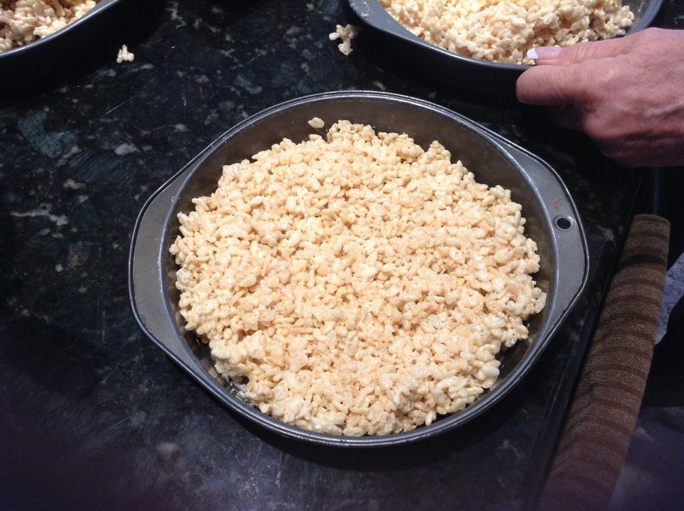 And flatten it with a spoon that is wet