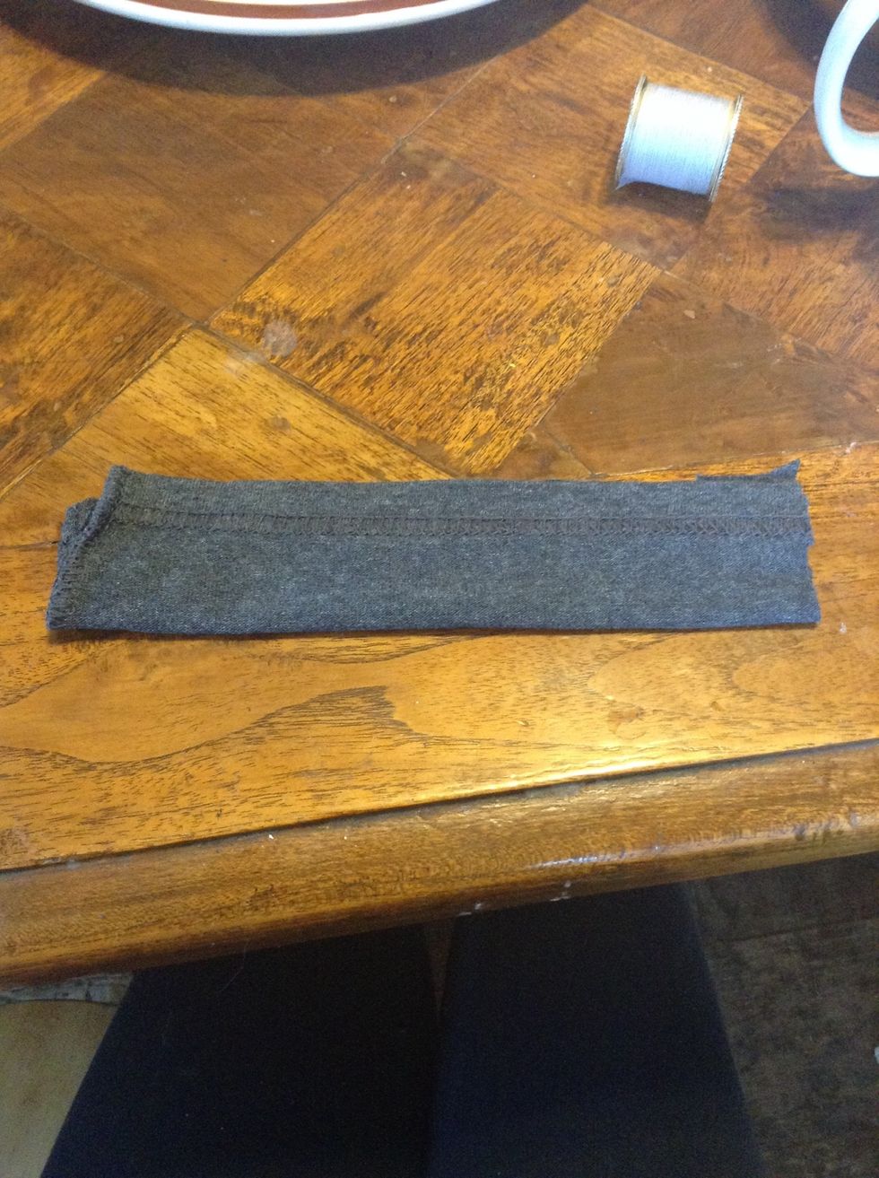 And fold it in half so the ugly side is now facing up (it will be flipped inside out later)