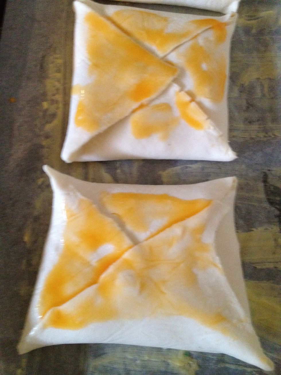 And fold it like this...preheat the oven (170) and brush the pastry with egg yolk