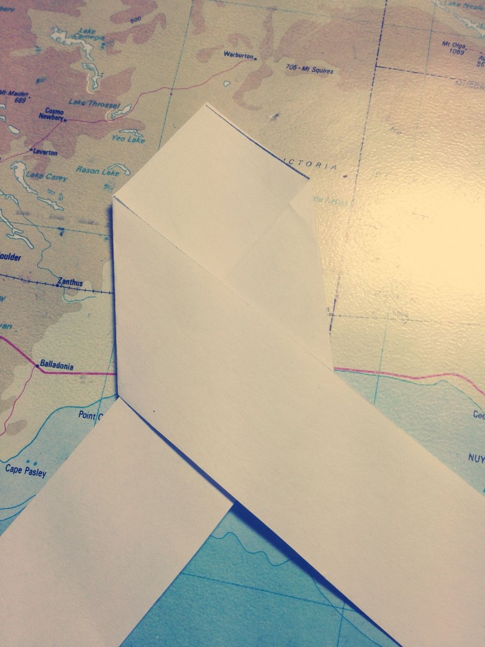 And fold it over to make a right angle with the first strip.