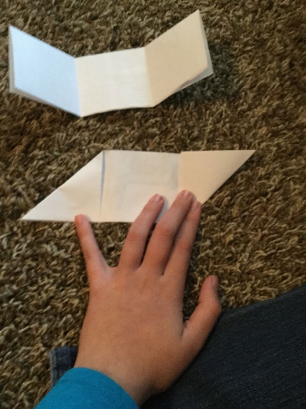 And fold the other side up into a triangle.
