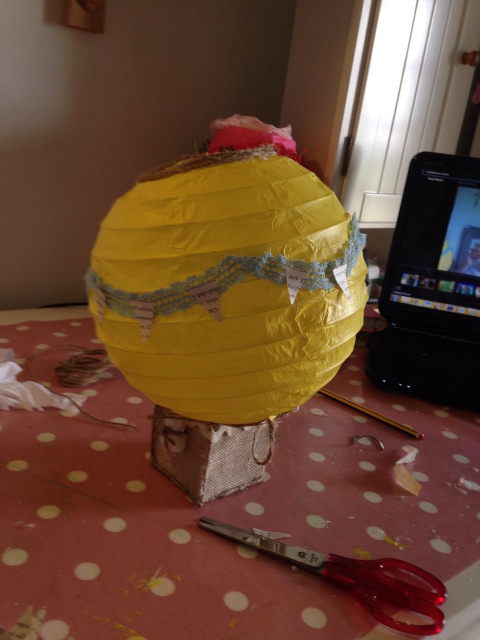 And glue to ballon; like bunting