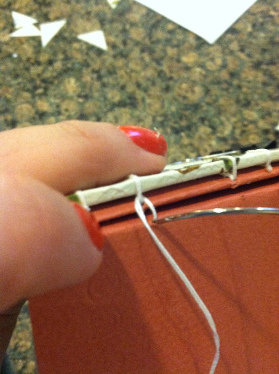 And go back through the same hole pull tight... Repeat until the end.