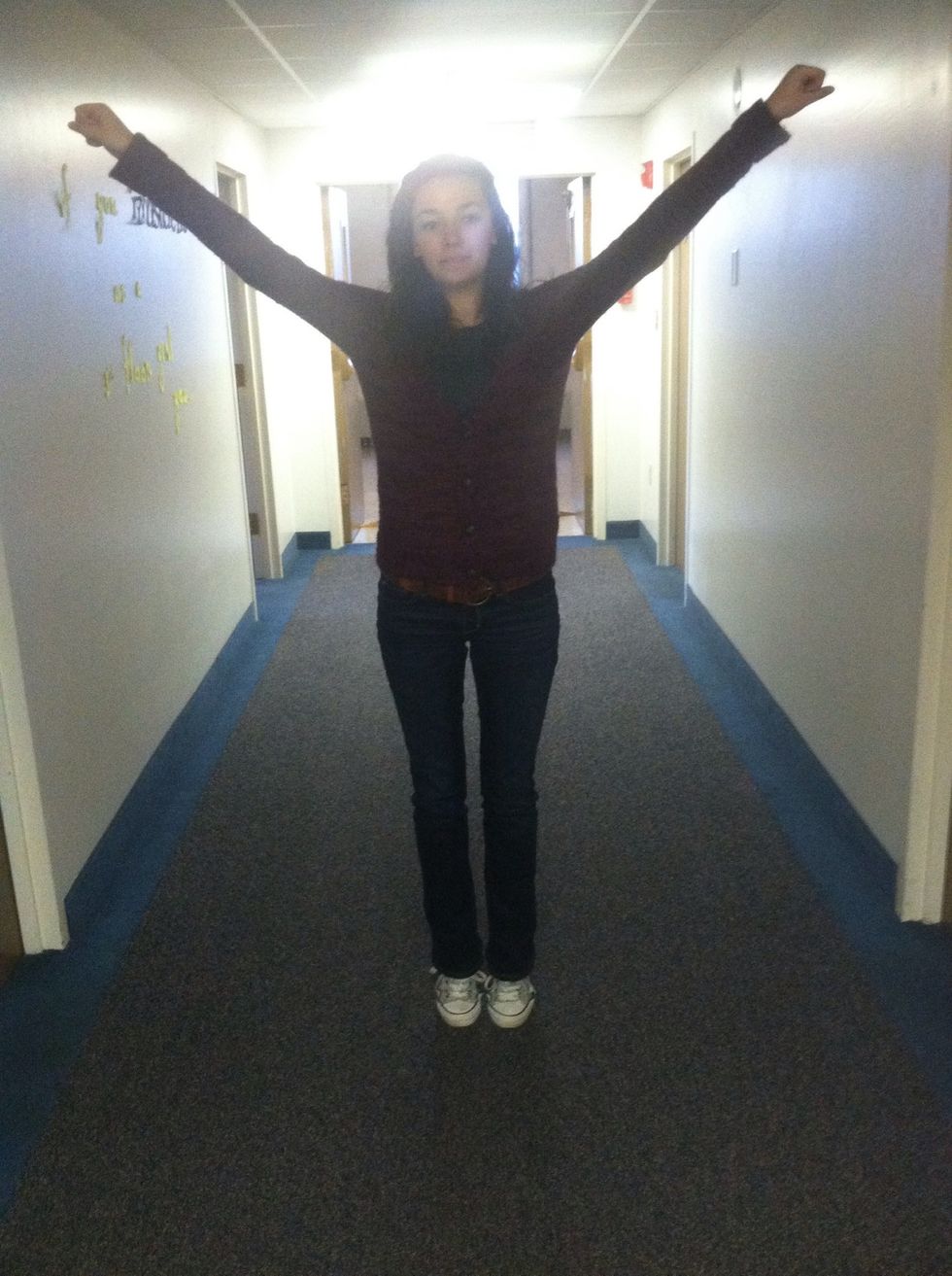 And go up on your toes with your arms in a "high v".