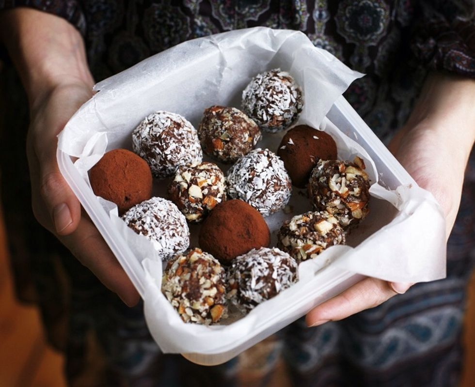 And here are our yummy date truffles :D i forgot to mention coconut :p i had some in my cabinet i rolled the date in it :p and just see the yummy easy to make date truflles :D