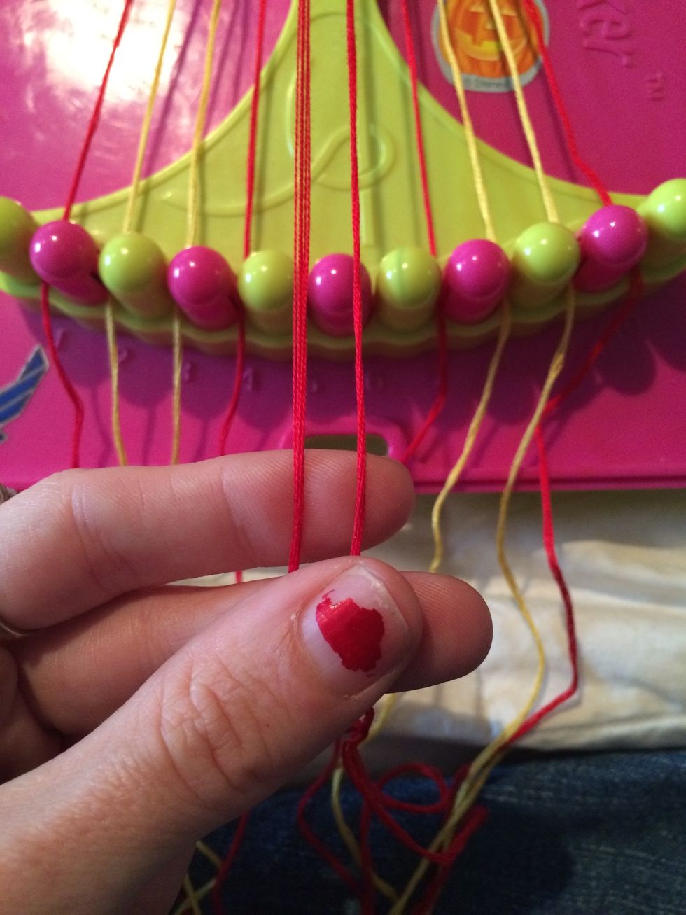 And here comes the fun part. Grab both of the middle strings.