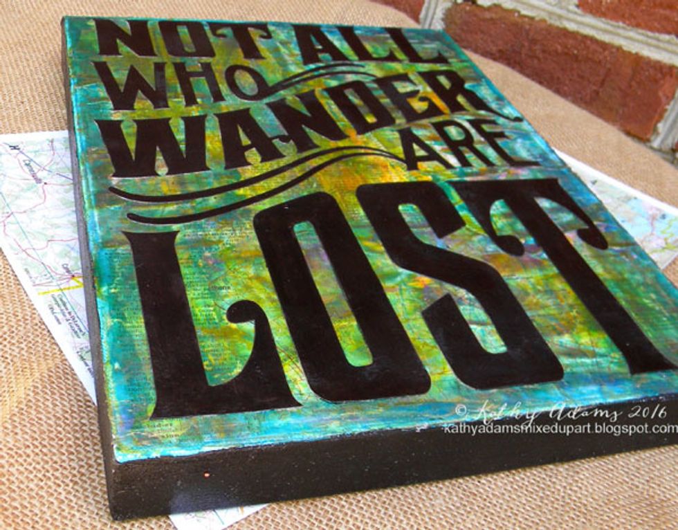 And here is a closeup of the finished canvas. You can still see the map and dictionary paper through all those layers. If you like that look, you must get some of Art Anthology's mediums!!