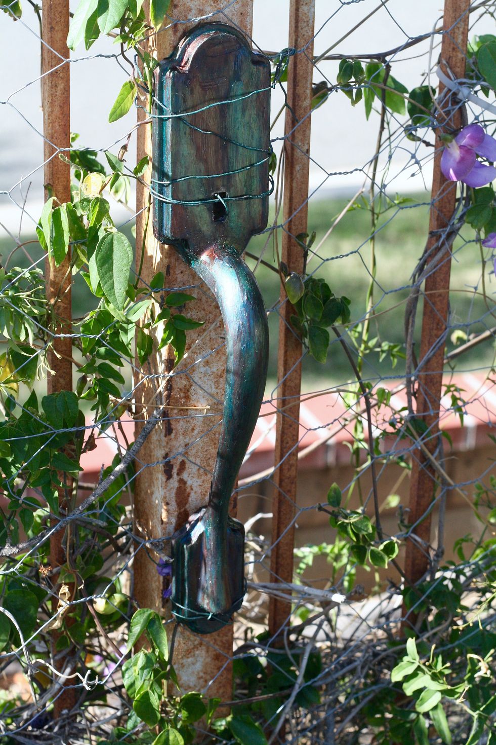 And, here is the full handle wired onto the fence!