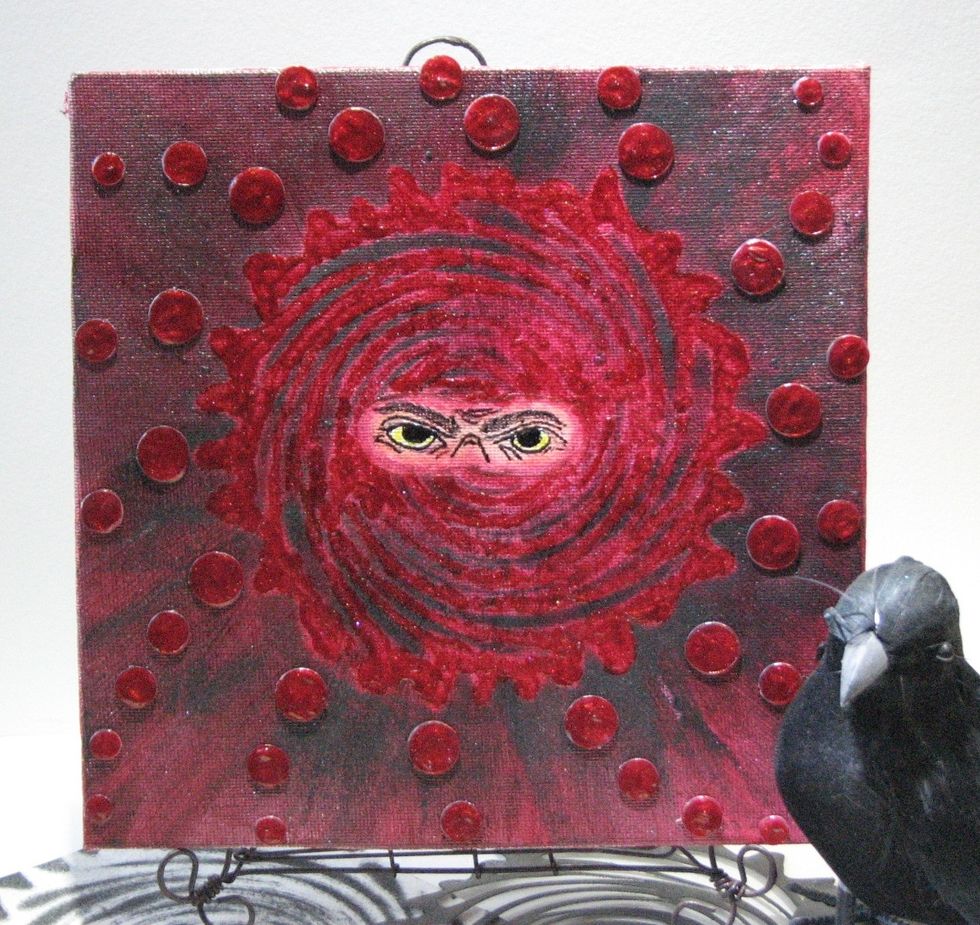And here's how it turned out....  Don't stare at those eyes for too long or you might fall under his spell.