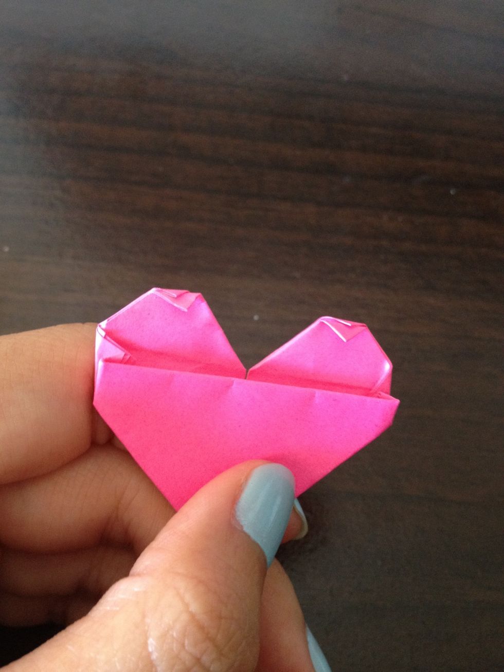 And here's the final step ! Fold the top of your origami heart