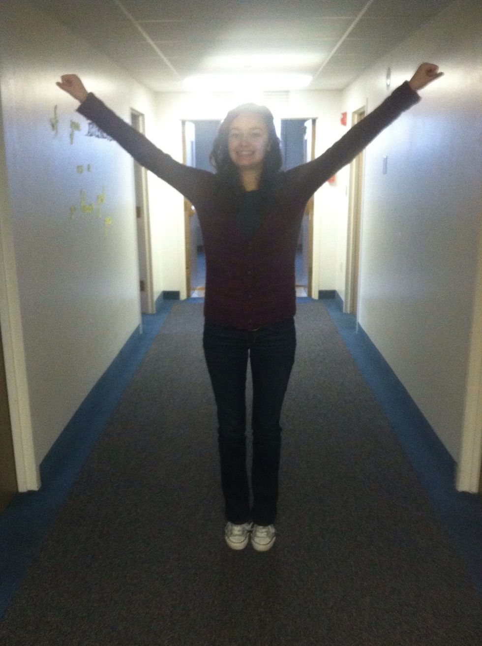 And hold your arms in a "high v".