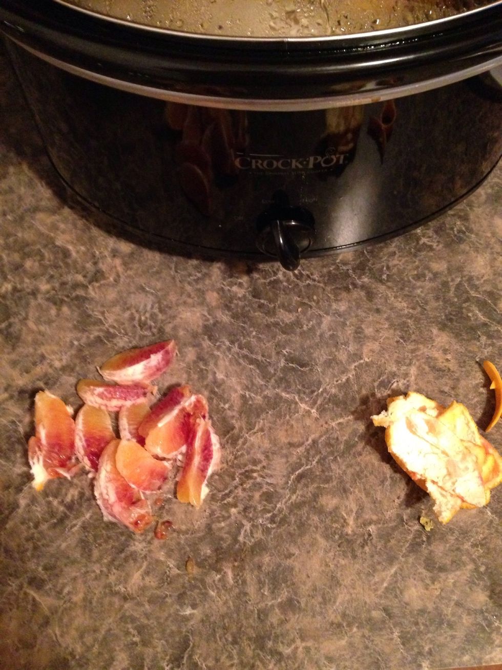 And I can't read. This is a blood red orange but still yummy. Section the orange into pieces.