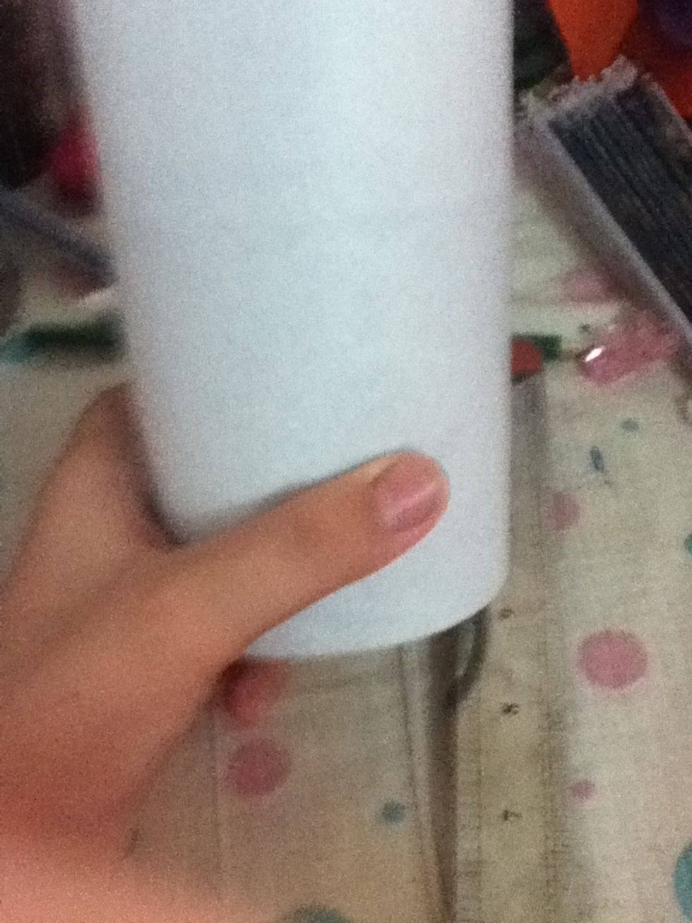 And I rolled the white fabric around the can