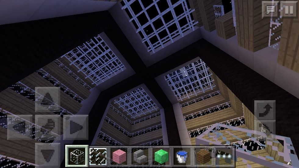 And if you look up, you'll notice that this house does not have a roof it's only made of glass panes so you can slip out easily