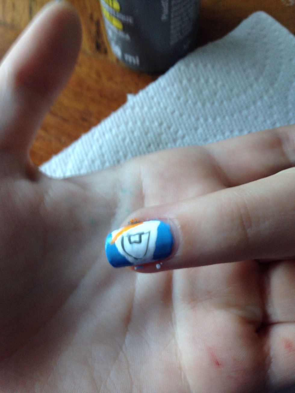 And in grey (or black) add his mouth, and leave a square for his tooth