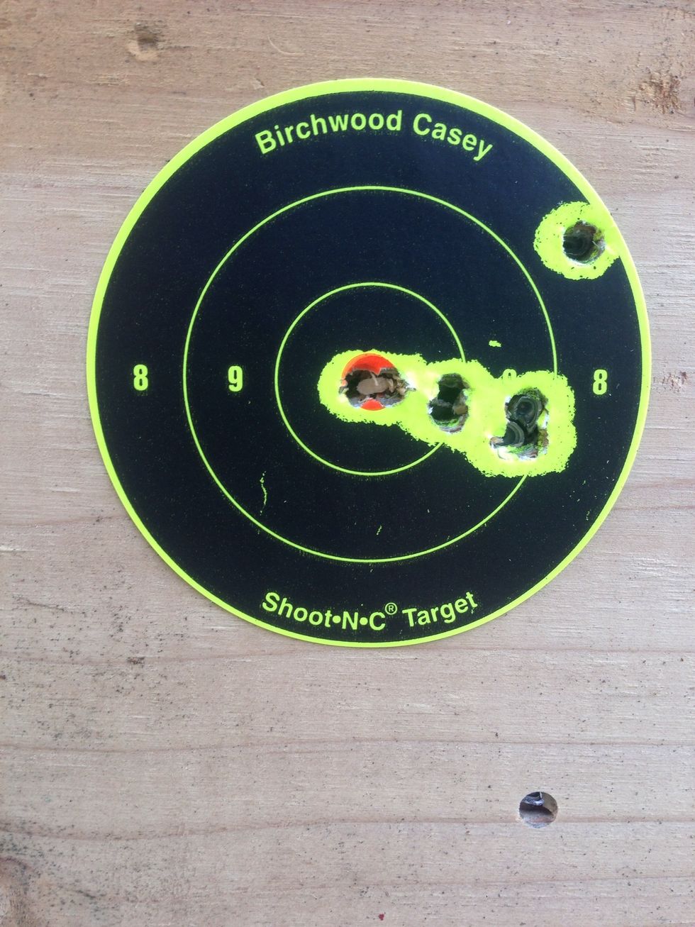 And just like that, you are shooting like a pro. 3 shots through the same hole. ~30 yards.