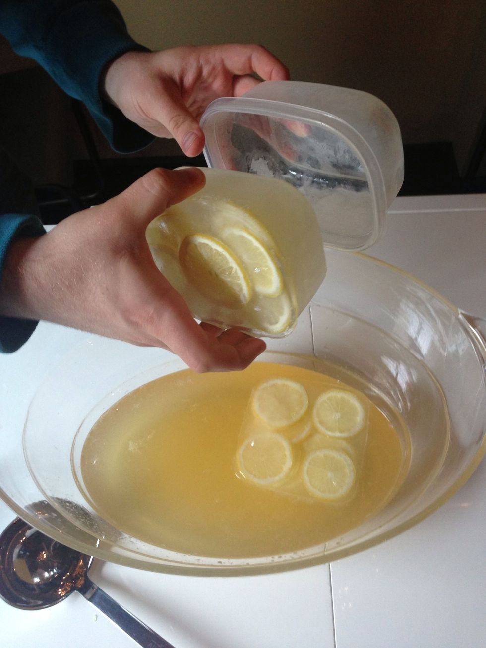 And last but not least, add the pretty ice cubes. Since they have been sitting out for a couple minutes, they should pop right out. If not, dip the containers in warm water to help loosen.