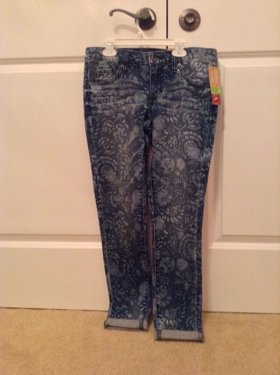 And lastly, I picked up these adorable lace patterned skinny jeans that are dark washed and have a cuffed end.