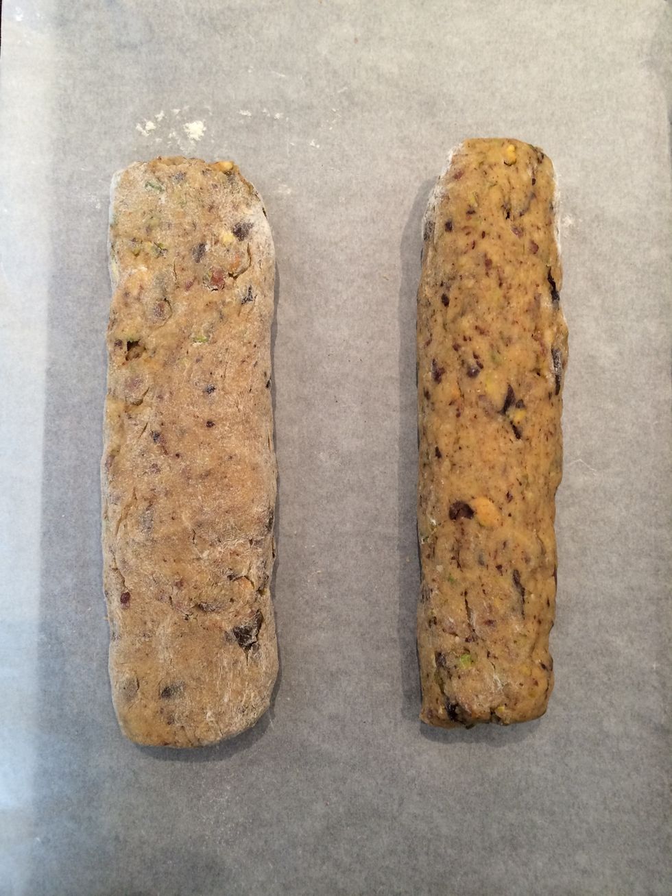 And make 2 rolls. Put them on a baking tray.