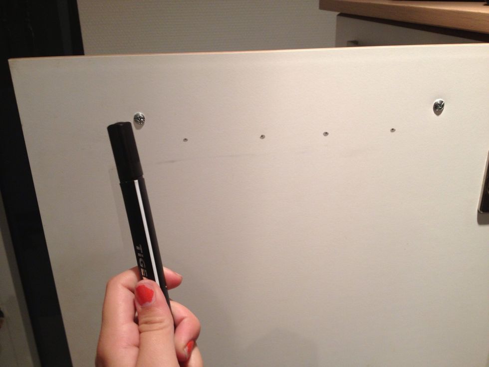 And make dots, on where you wanna glue your wine corks on