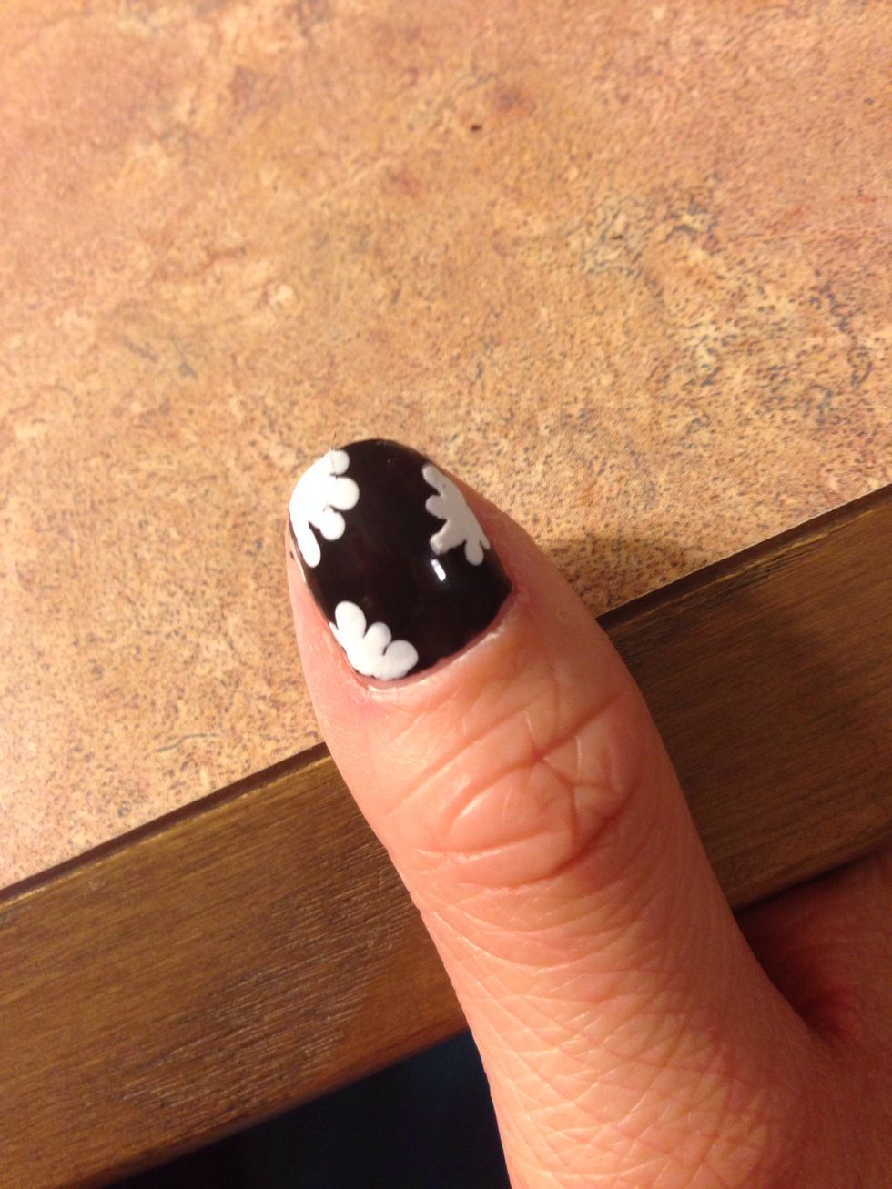 and making petals on your nails in the places you want