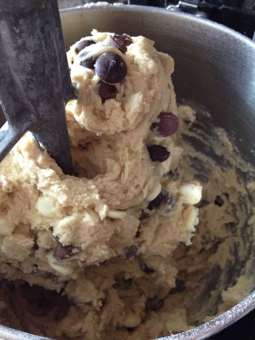 And mix them in! Resist temptation to eat this dough because it has raw ingredients in it. Must. Cook. First. :)