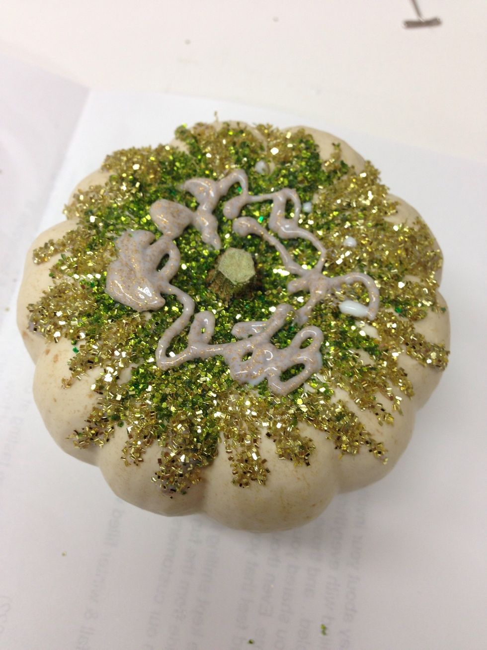 And more squiggles of glitter glue on top of your pumpkin to hold the sequins and confetti.