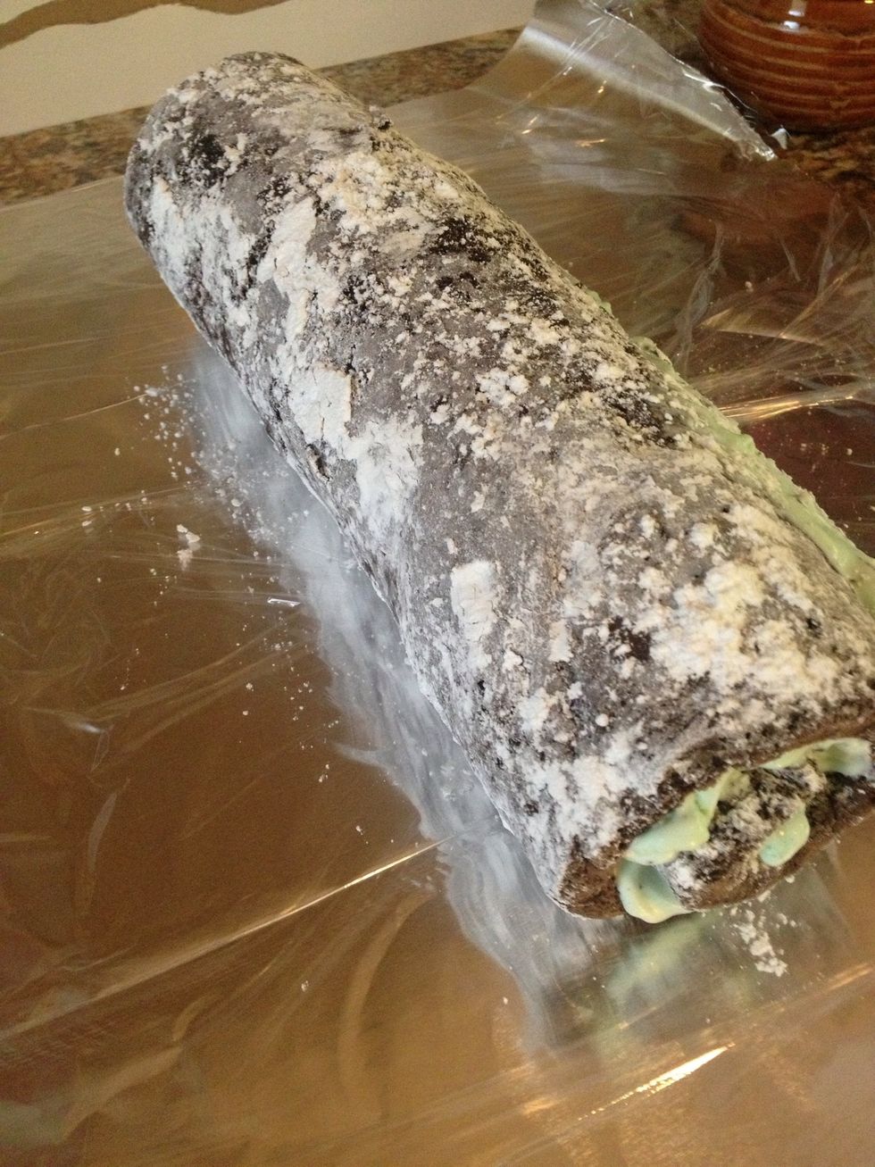 And move it too the aluminum foil and Saran Wrap you had laid out earlier.