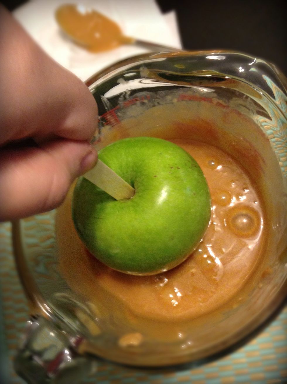 And now its time :)! Simply dunk your apple into the caramel sauce gently turning the apple to allow the caramel to get ALL of the apple.